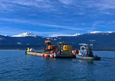 Skemxist Solutions Equipment Tug Boat Moving Barge with Excavators for Waterway Cleanup Project